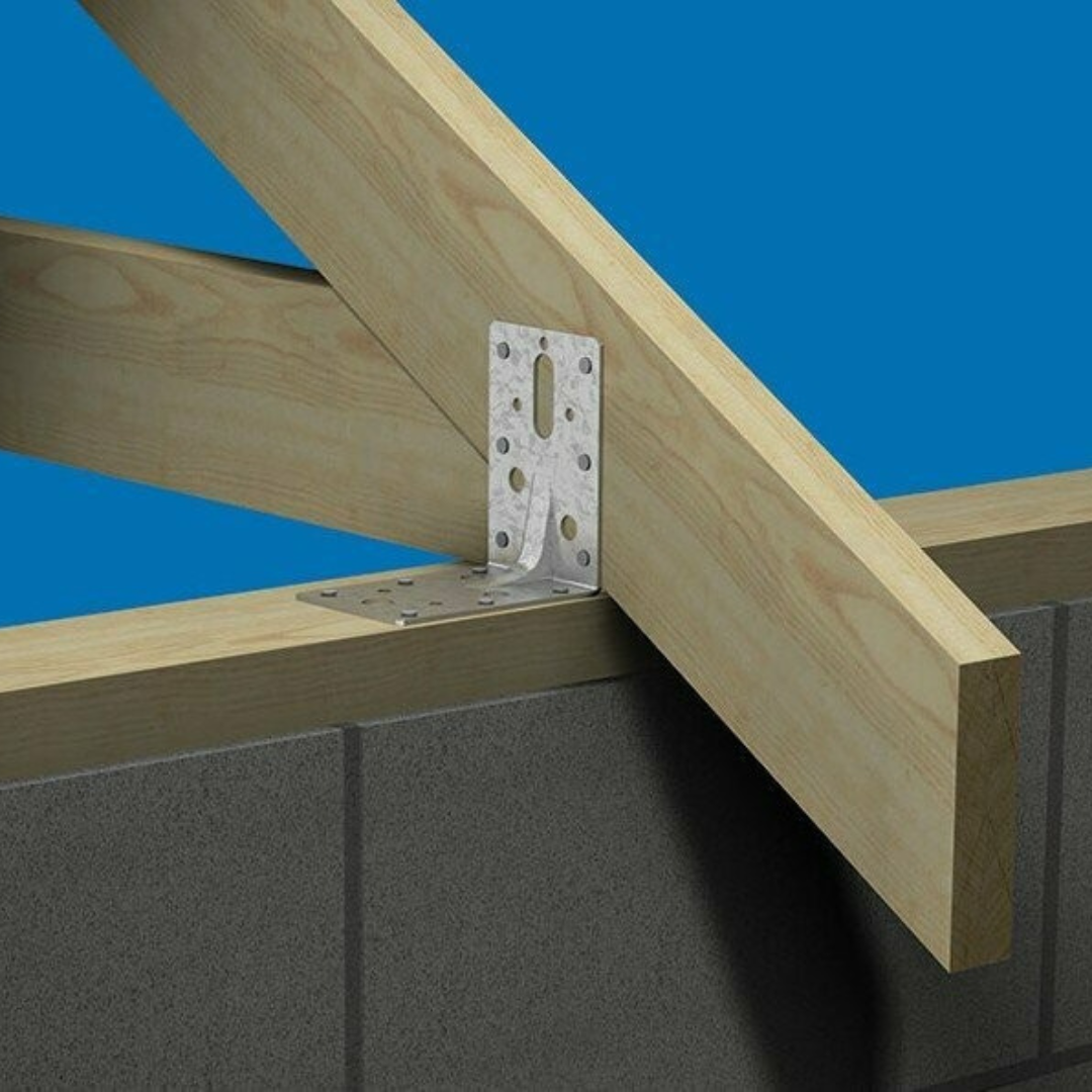 the angle bracket in use as it secures the wood to the wall