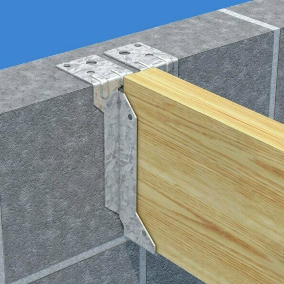 a joist hanger in use connecting the timber to a block wall