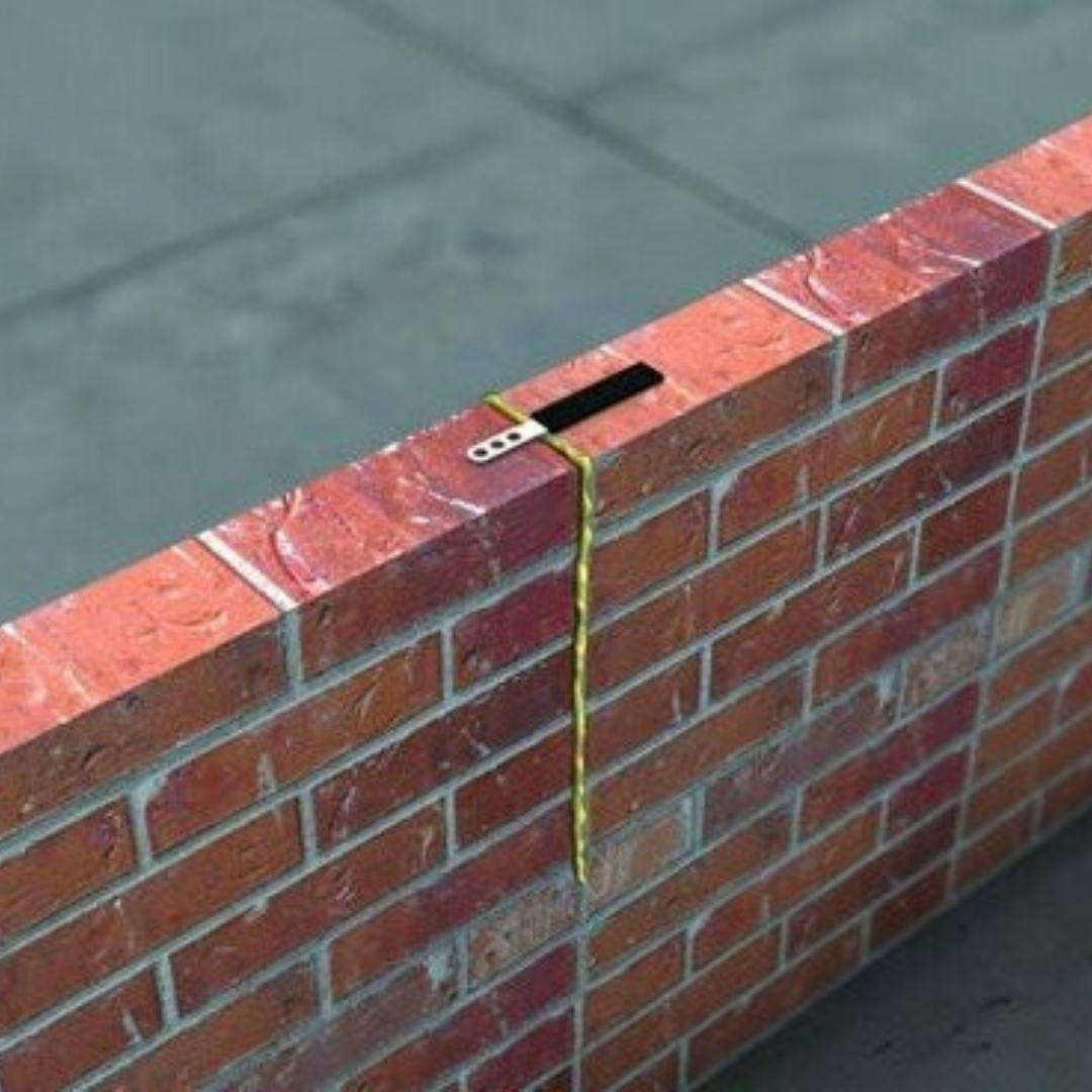 a movement tie on a brick wall